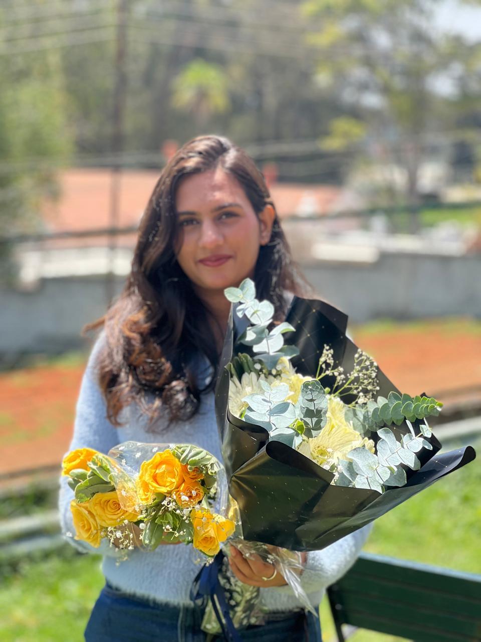 Fresh yellow roses and white chrysanthemum bouquet with eucalyptus foliage in Ooty